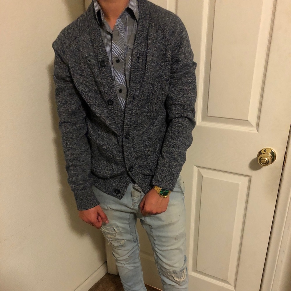 Blue cardigan.